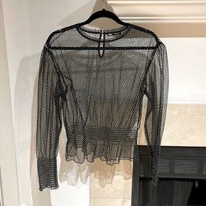 Sheer blouse, never worn. Black w/ tiny white polka dots.